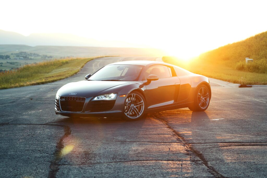 Sleek Black Audi R8 at Sunset – Stunning Wallpaper Background