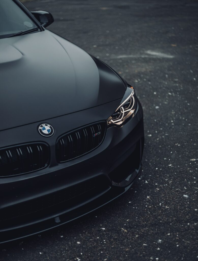 Elegant Black BMW M3 Wallpaper: Distinctive Design & Luxurious Curves