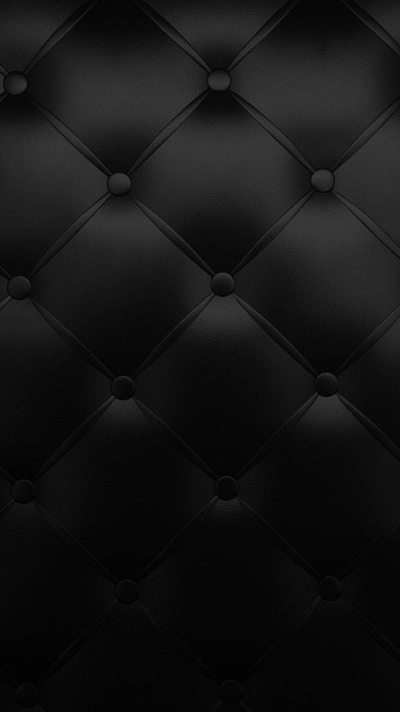 Sleek black cushioned leather wallpaper with tufted diamond pattern and subtle button details