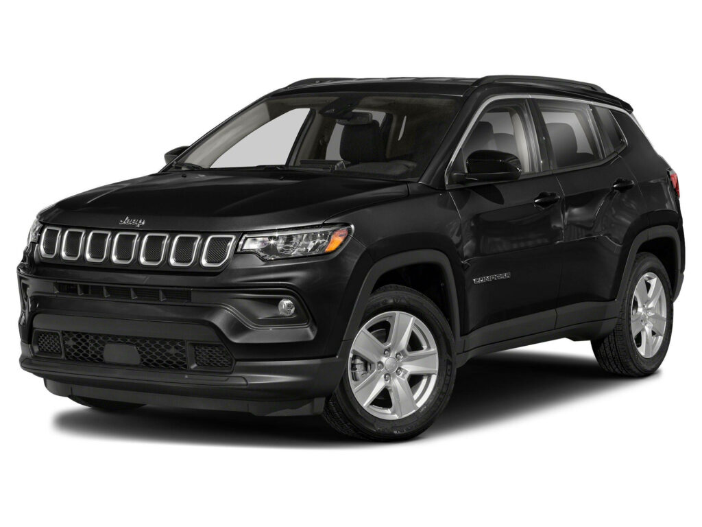 Black Jeep Compass SUV on white background showcasing bold modern design and sleek exterior Wallpaper