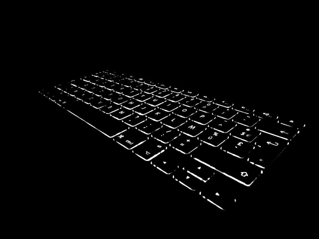 Stylish Black Keyboard Wallpaper with Striking Backlit Keys
