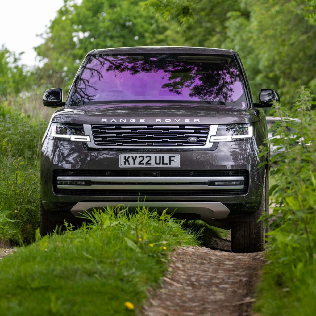 Sleek Black Land Rover LR4 Off-Road Adventure Wallpaper Background