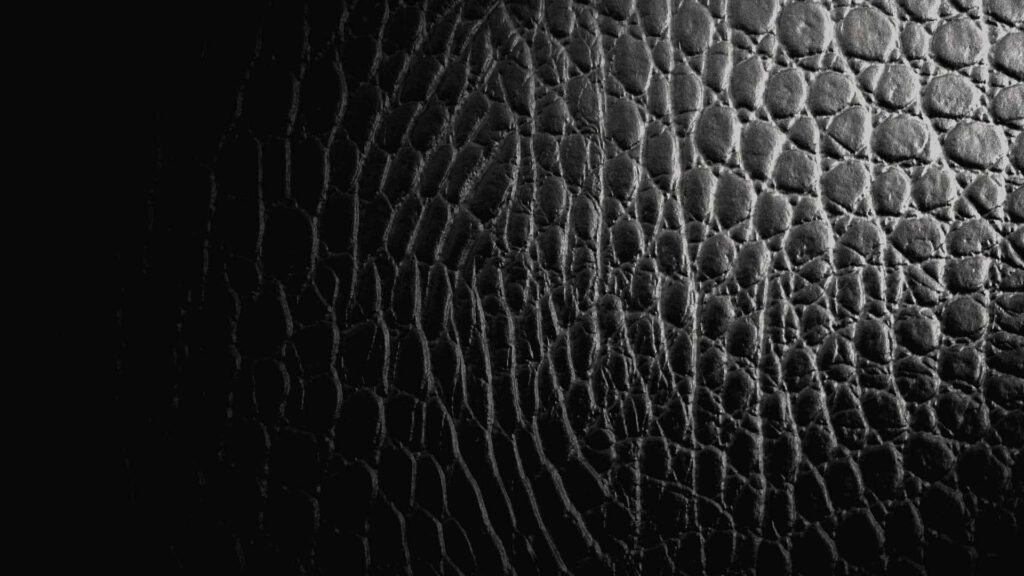 Sleek Black Leather Texture Wallpaper for Stylish Background