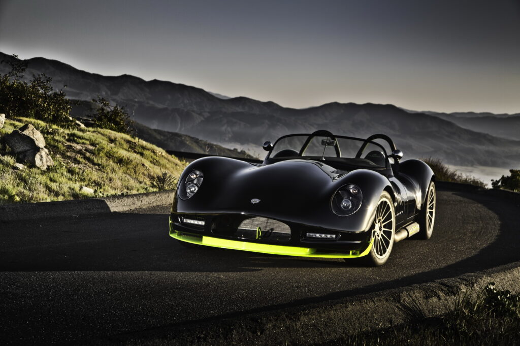 Sleek Black Lucra LC470 R: Scenic Mountain Road Wallpaper