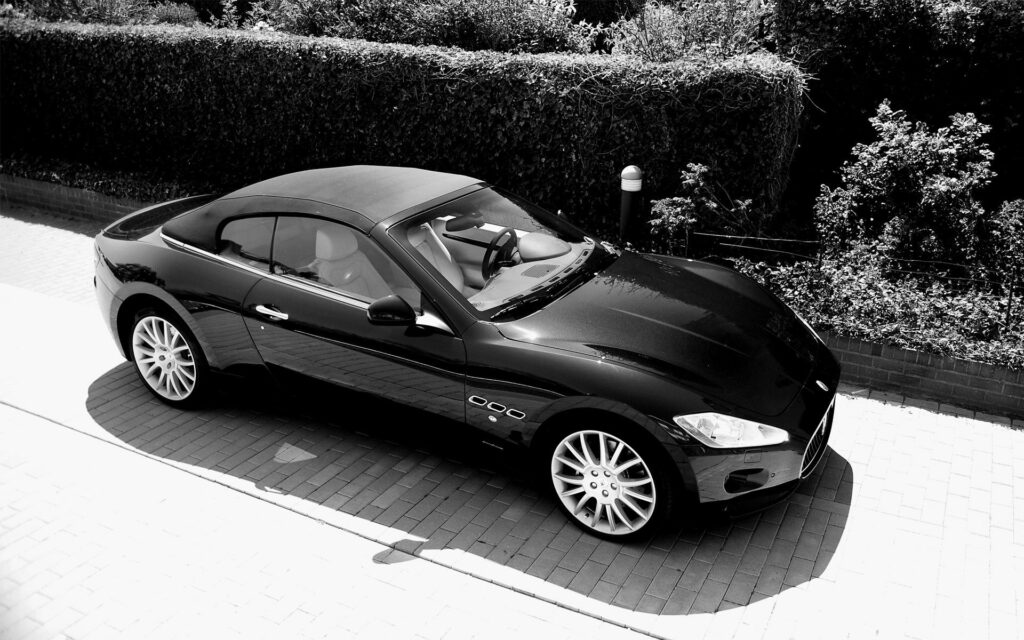 Top View of Sleek Black Maserati Wallpaper - Elegant Car Background