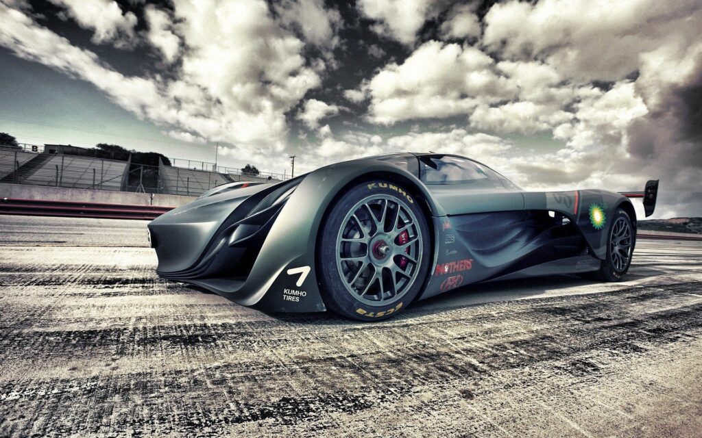Sleek Black Mazda Sports Car Wallpaper on Racing Track