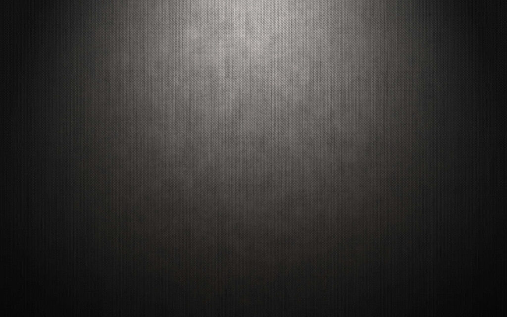 Sleek Black Metal Textured Wallpaper with Soft Radiant Light