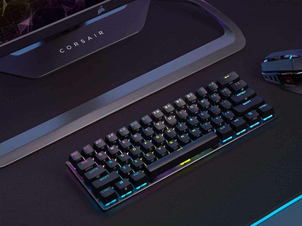 Sleek Black Minimalist RGB Keyboard on Modern Desk Setup Wallpaper