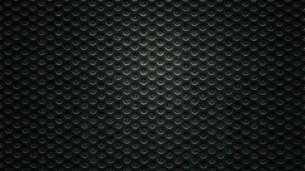 Sleek Black Textured Wallpaper with Circular Holes - Modern Aesthetic