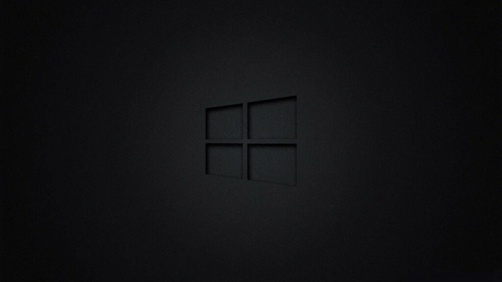 Futuristic Black Windows 10 HD Logo Emerging from the Shadows Wallpaper