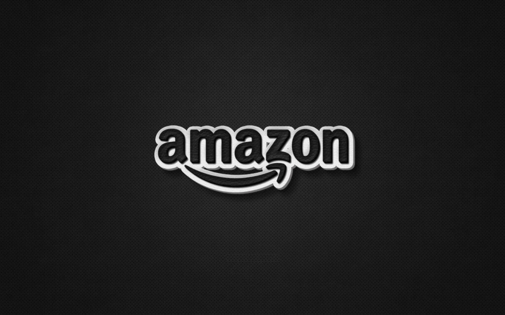 Amazon logo in bold black and white on textured dark background minimalist modern wallpaper