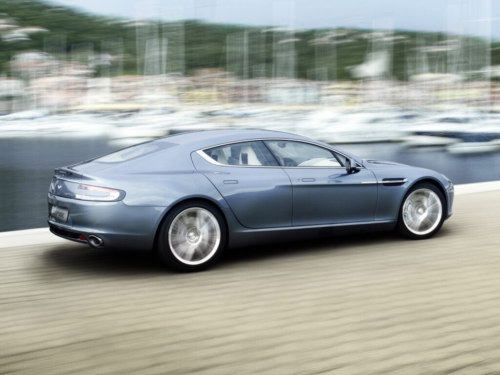 2009 Aston Martin Rapide: Sleek Blue Wallpaper with Dynamic Side View