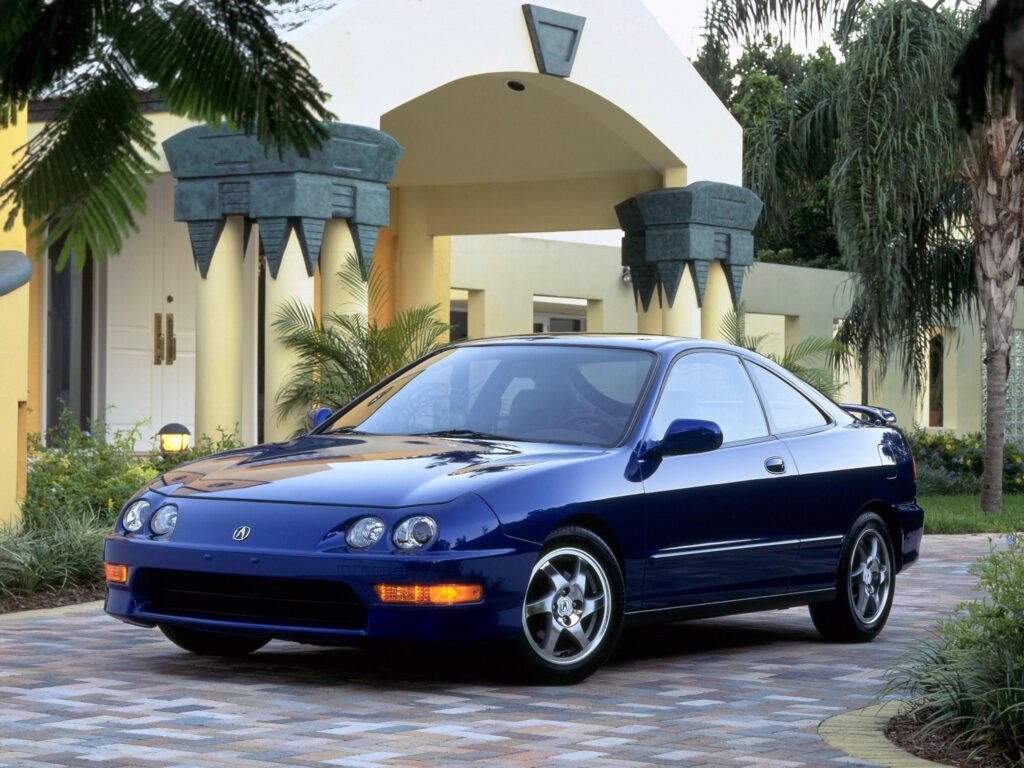 Stylish Blue Acura Integra GS-R Coupe in Urban Setting Wallpaper