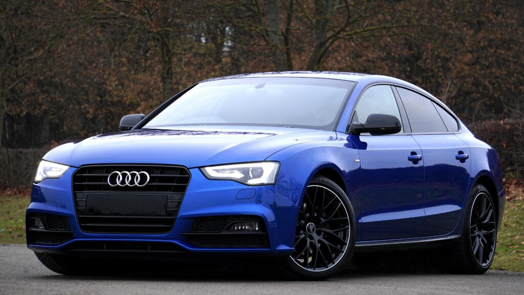 Elegant Blue Audi A5 Wallpaper: Sleek Design & Scenic Background