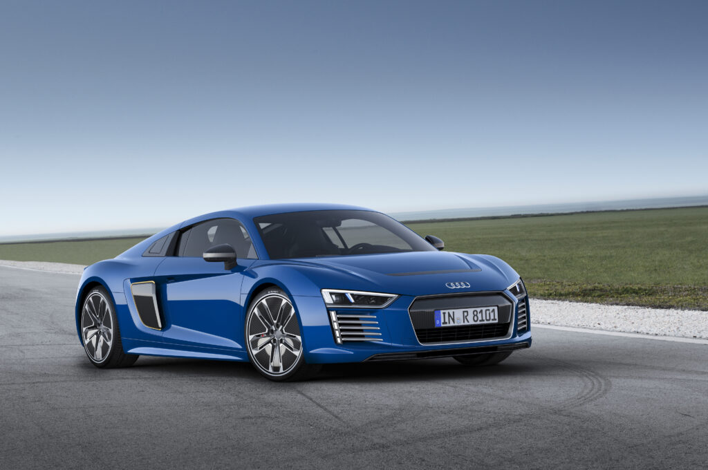 Sleek Blue Audi R8 e-tron Side View Wallpaper in Serene Landscape