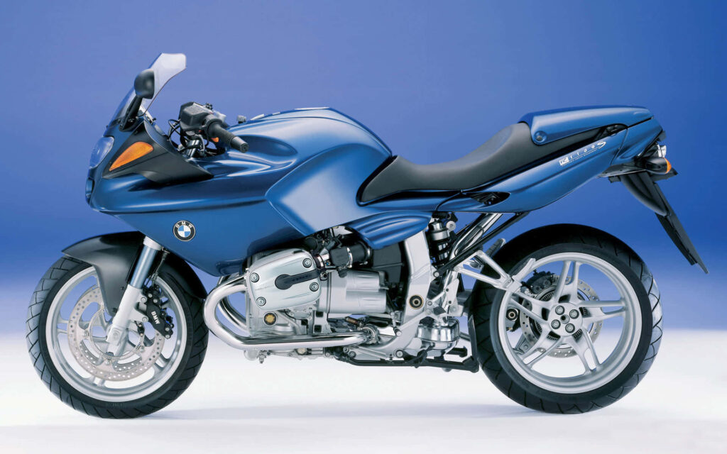 Sleek Blue BMW Motorcycle Wallpaper - Minimalist Thrill for Enthusiasts