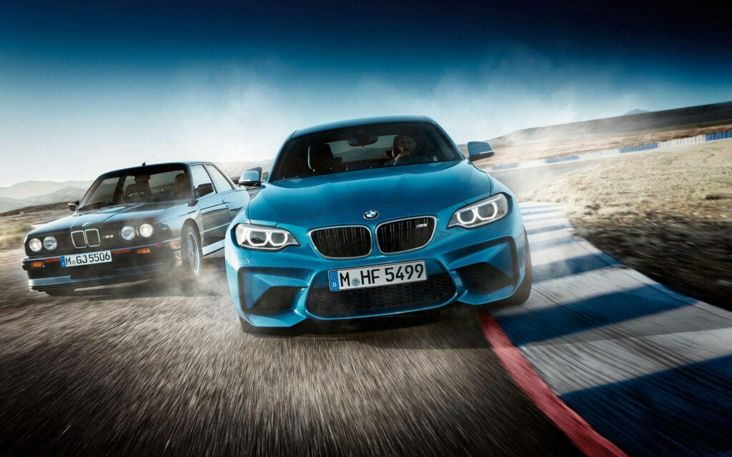 Blue BMW speeding on race track dynamic wallpaper showcasing high performance driving thrill