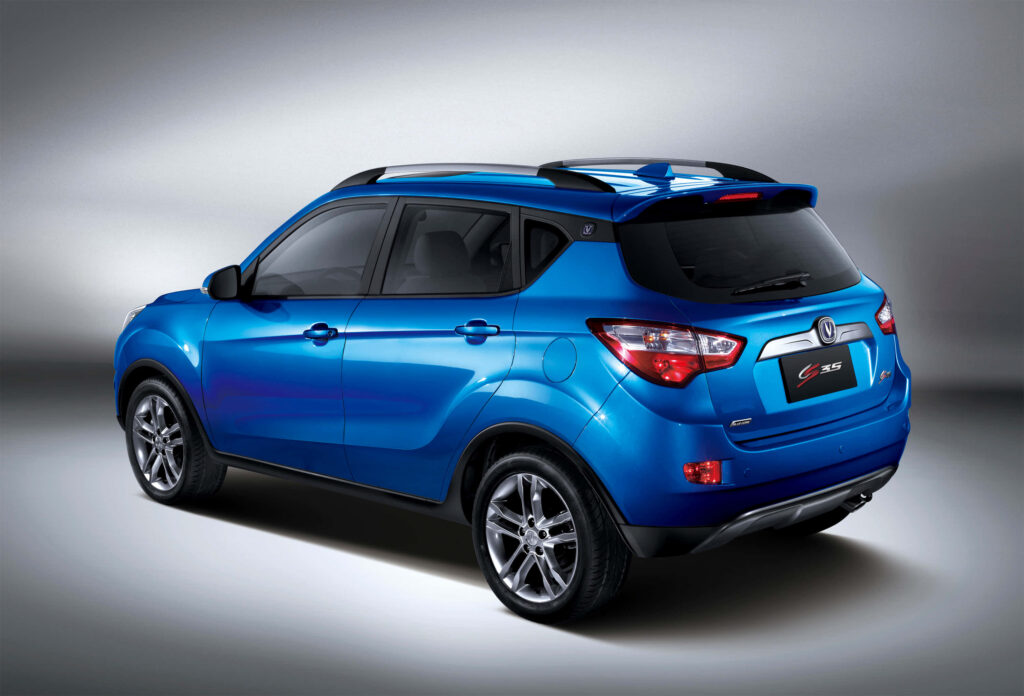 Blue Changan SUV rear-side view on gray background showcasing sleek modern urban design wallpaper