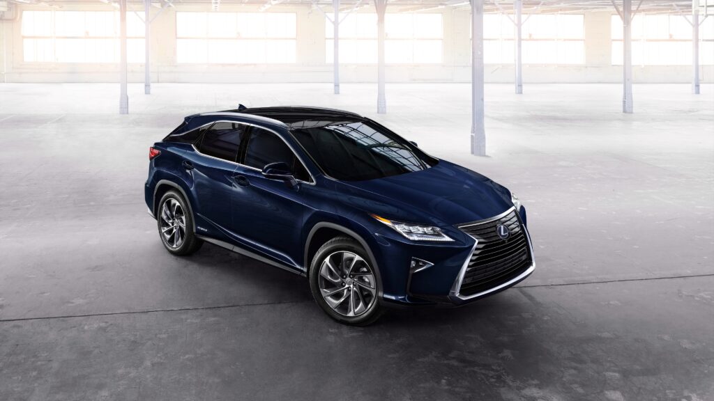 Sleek Blue Lexus RX 450h - Side View in Modern Interior Wallpaper