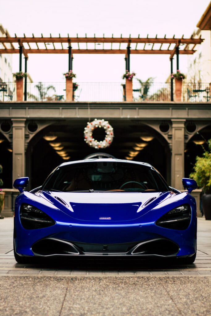 Front View Blue Sports Car Wallpaper - Sleek Design & Architecture
