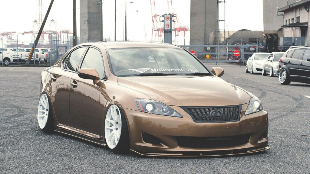 Lowered Brown Lexus IS 250 Wallpaper: Aggressive Stance & Custom Design