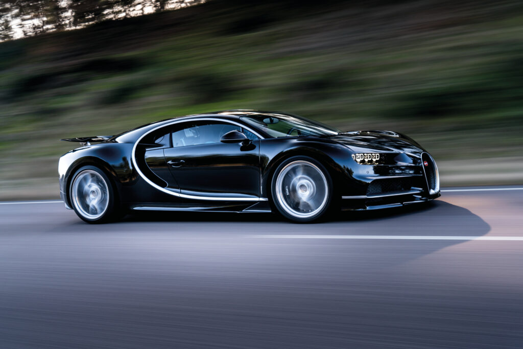 Dynamic Bugatti Chiron: Elegance & Speed in Motion Wallpaper