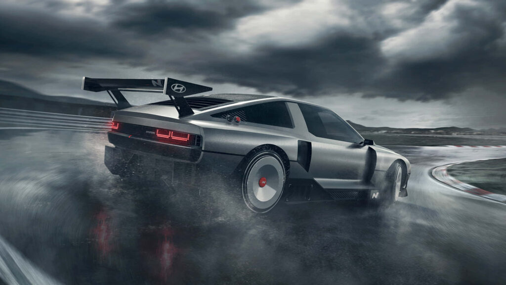 Sleek car racing fast on wet winding track under dramatic rainy stormy skies wallpaper background