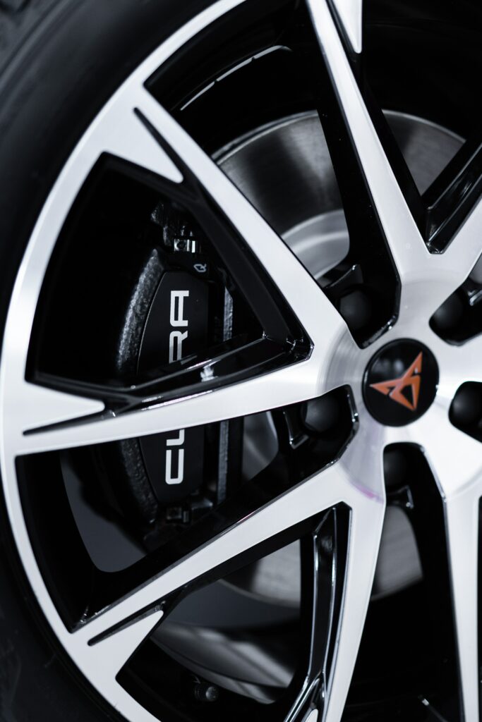 Close-Up of Sleek Alloy Car Wheel & Tire Wallpaper for Auto Lovers