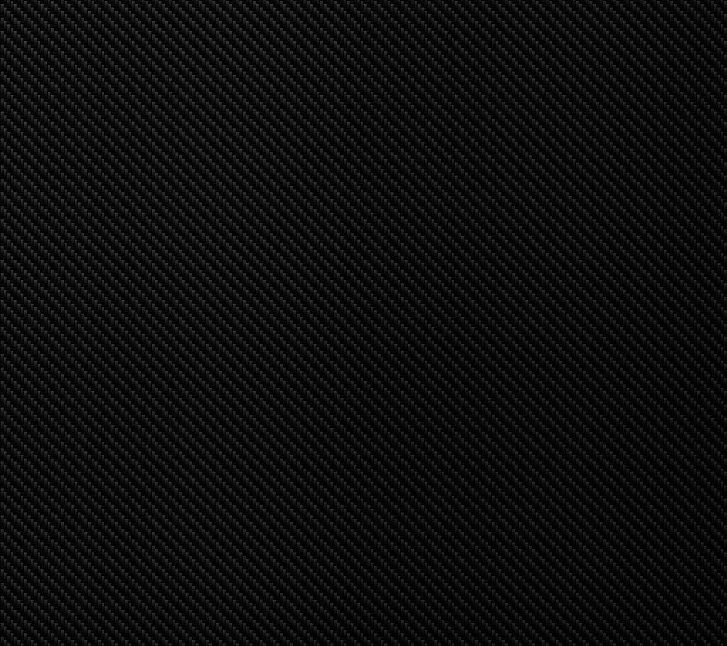 Sleek black carbon fiber wallpaper with diagonal weave pattern adding modern industrial style