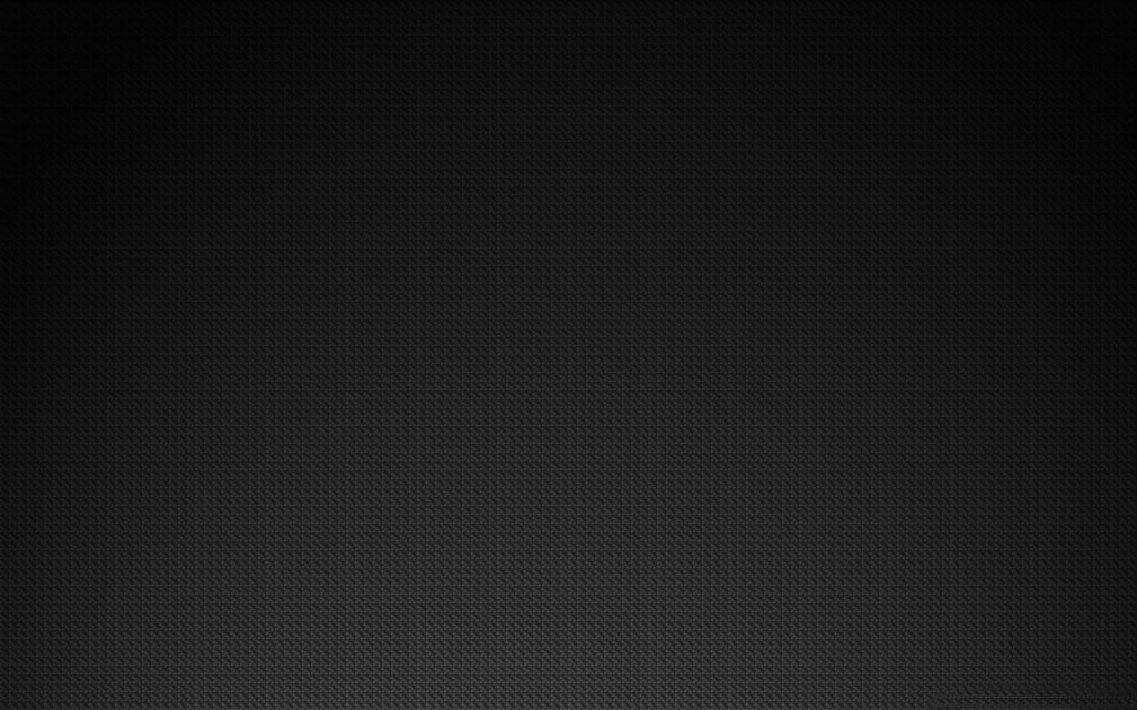 Sleek dark carbon fiber wallpaper with woven pattern and subtle gradient lighting background