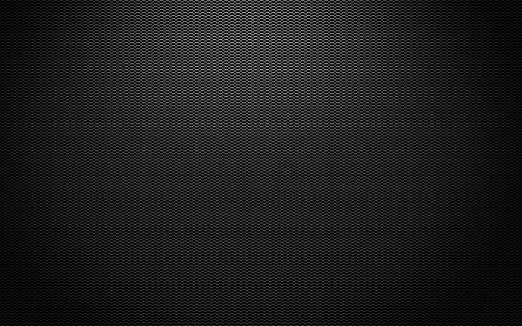 Carbon fiber wallpaper with detailed woven grid pattern dark minimalist textured design background