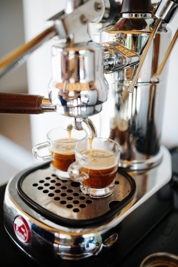Sleek Coffee Machine Brewing Fresh Espresso: Wallpaper Delight