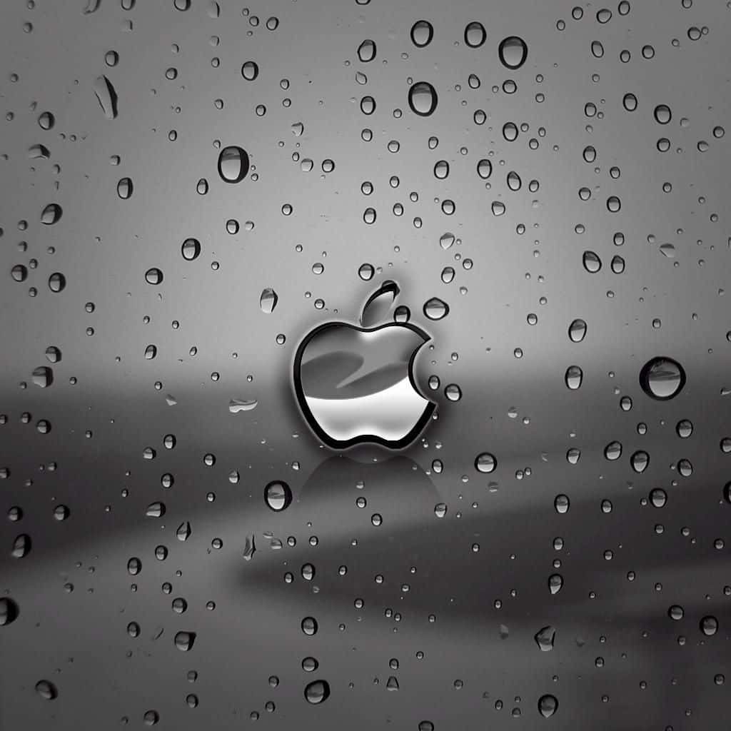 Sleek dark metallic Apple logo on grey background with water droplets minimalist iPad wallpaper