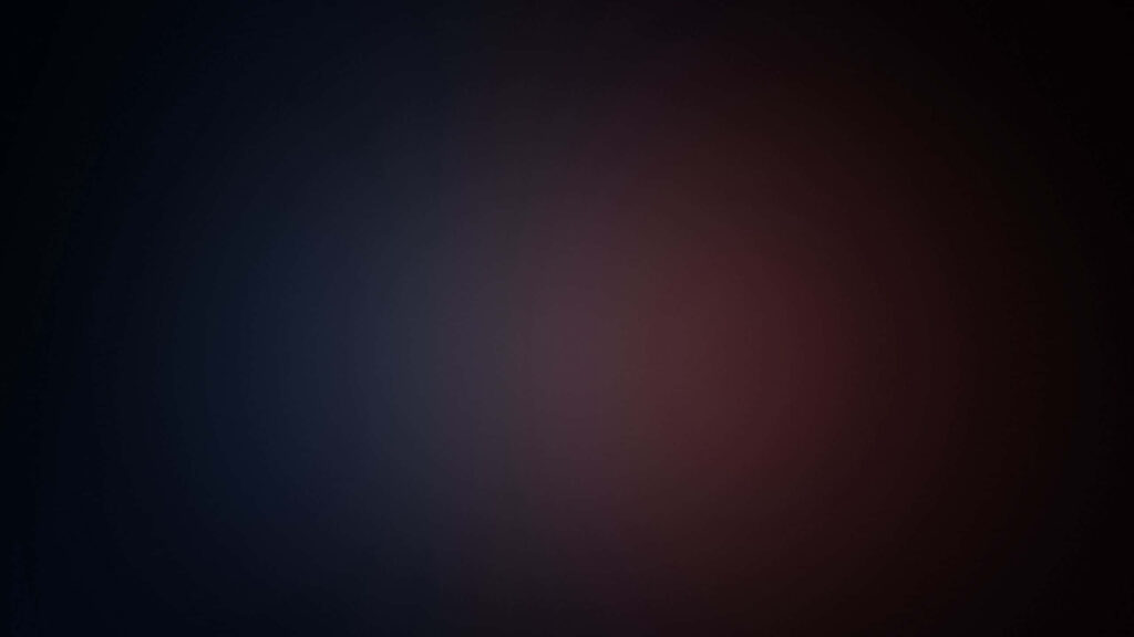 Sleek Dark Gradient Wallpaper: Subtle Blue, Red & Black Blend