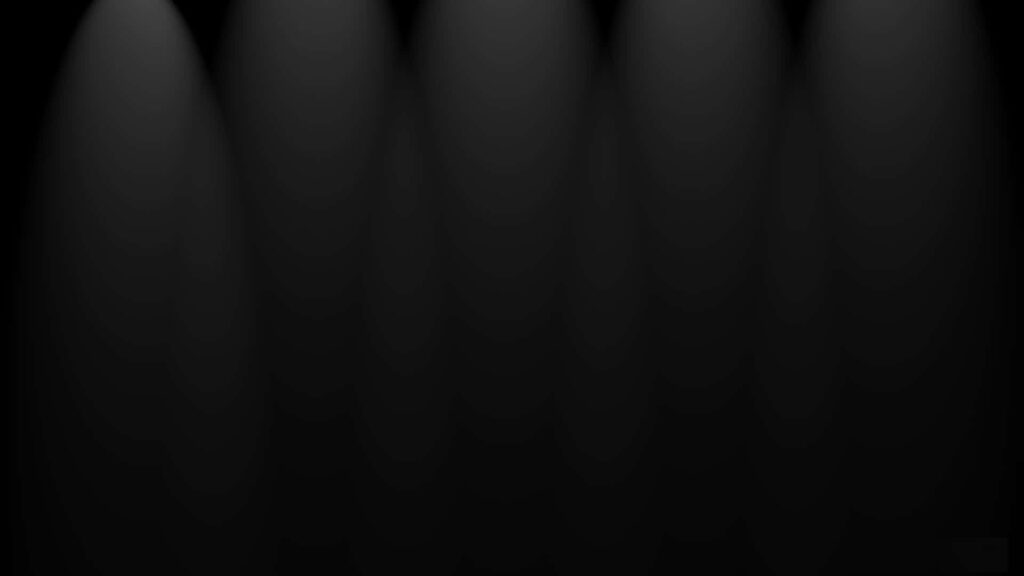 Minimalist Dark Gradient Wallpaper with Subtle Spotlight Effects