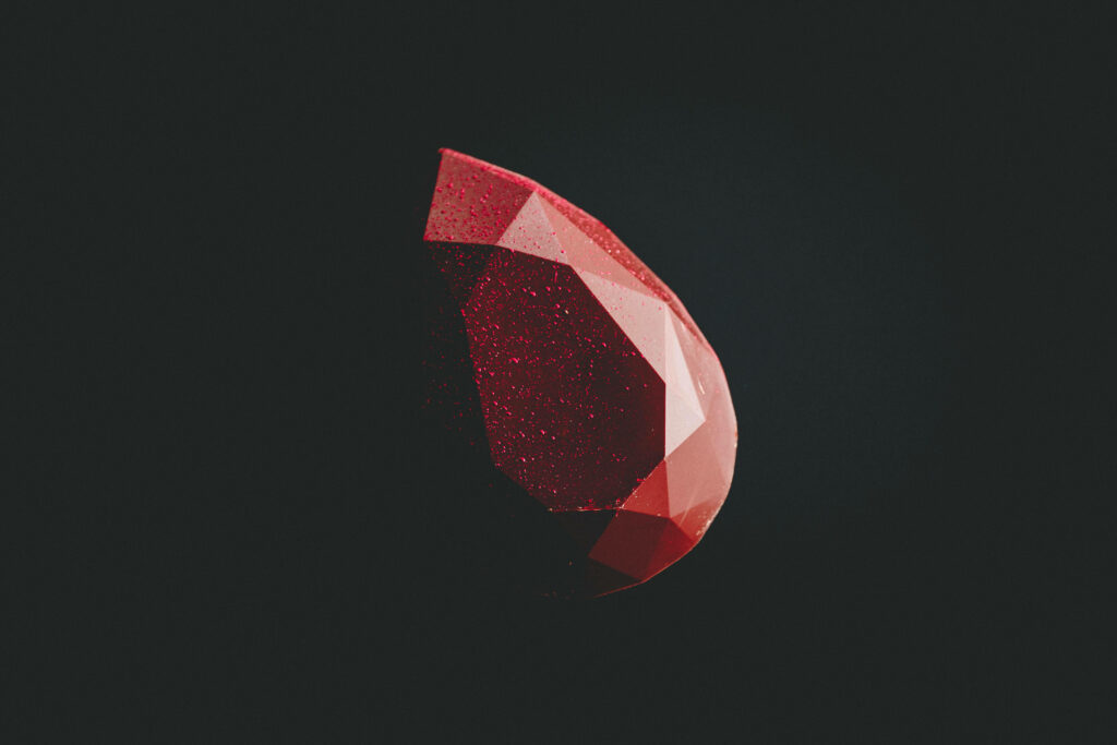 Elegant Dark Minimalist Wallpaper with Deep Red Ruby on Black