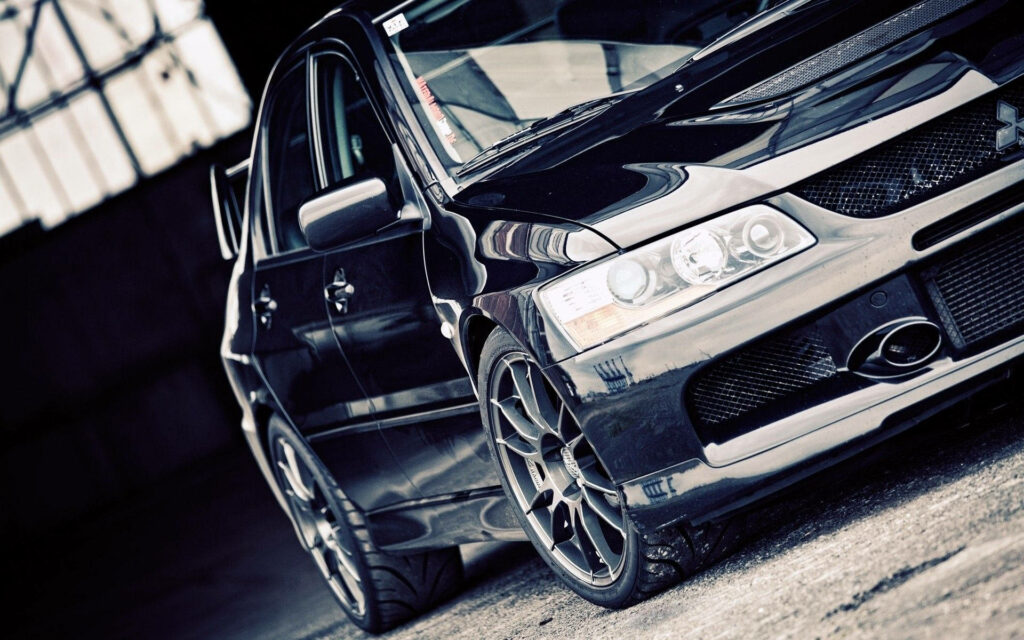 Sleek Dark Mitsubishi Lancer Wallpaper: Captivating Design & Style