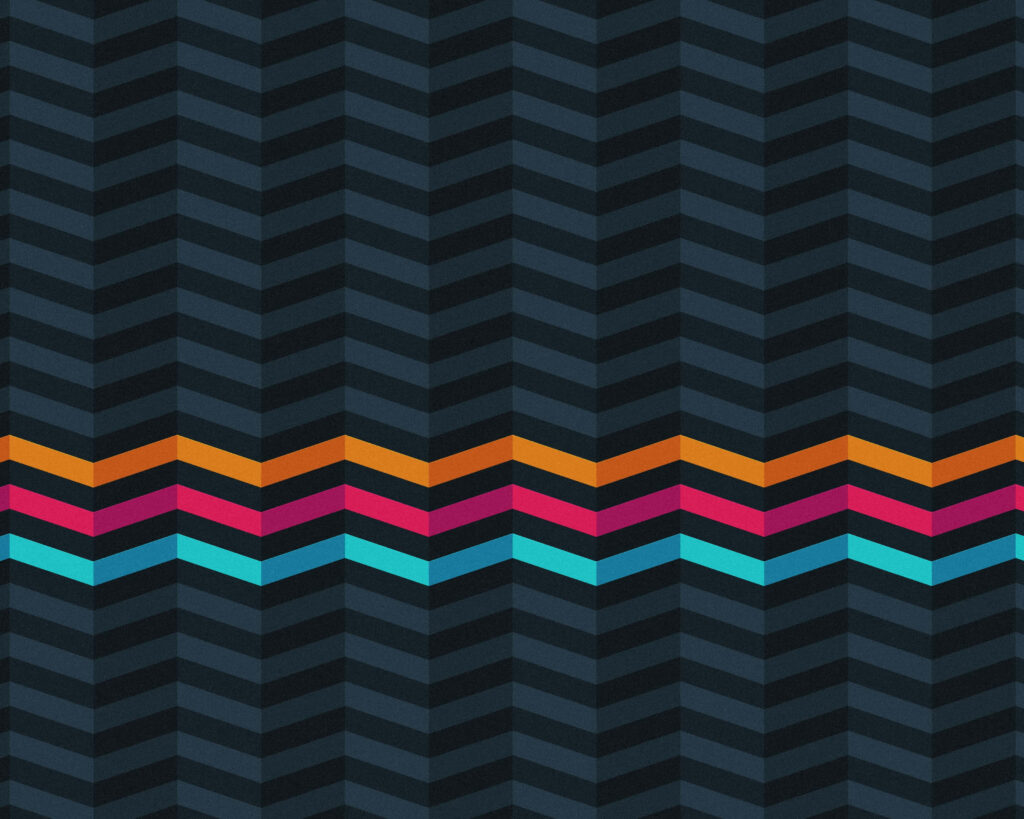 Modern Zigzag Wallpaper: Dark Background with Colorful Chevron Design
