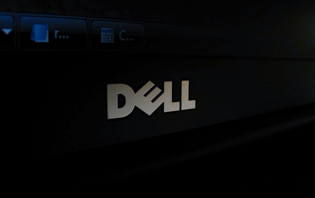 Dell wallpaper with silver logo on dark minimalistic background professional modern design