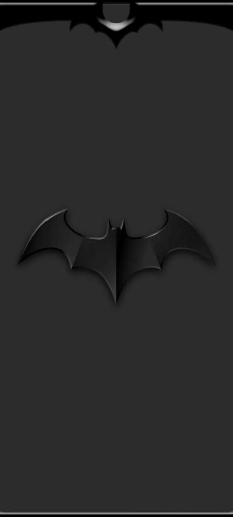 Embossed black Batman logo on dark background sleek stylish iPhone wallpaper for Batman fans