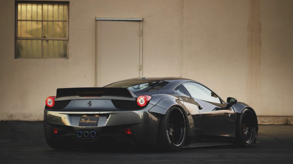 Sleek Ferrari 458 Rear View Wallpaper – Sporty Design in Dark Elegance