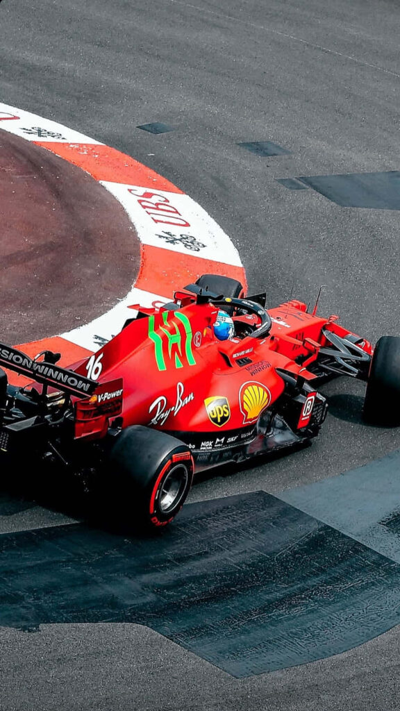 Unleashing the Blazing Speed: Ferrari F1 Shows its Dominance on the Racetrack Wallpaper