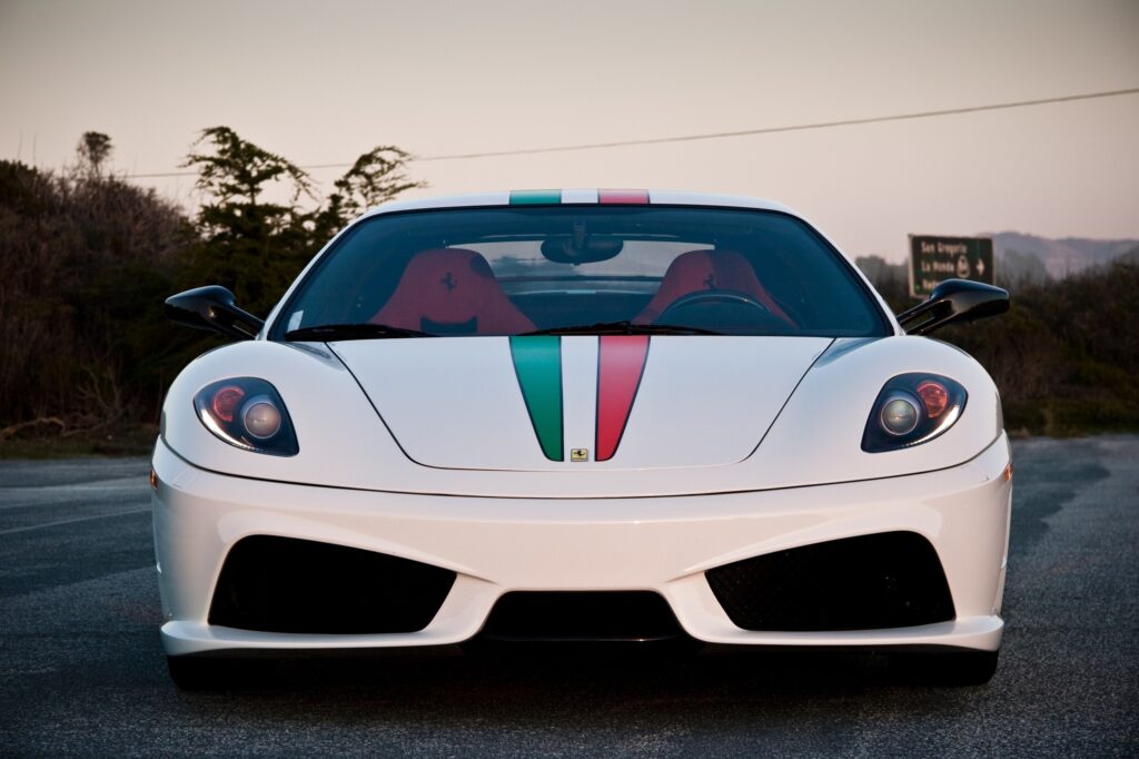 Sleek Ferrari Wallpaper: Iconic Design & Italian Flag Elegance