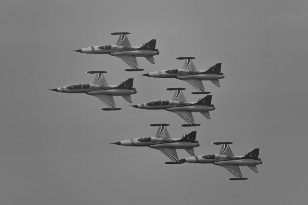 Sleek Fighter Planes in Perfect Unison: Aerial Precision Showcase Wallpaper