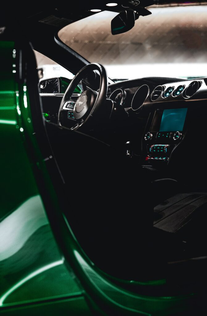 Ford Mustang Interior Wallpaper: Sleek Steering Wheel & Control Panel
