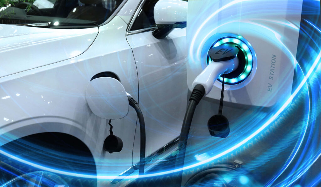 Futuristic Electric Car at Advanced Charging Station - Green Tech Wallpaper