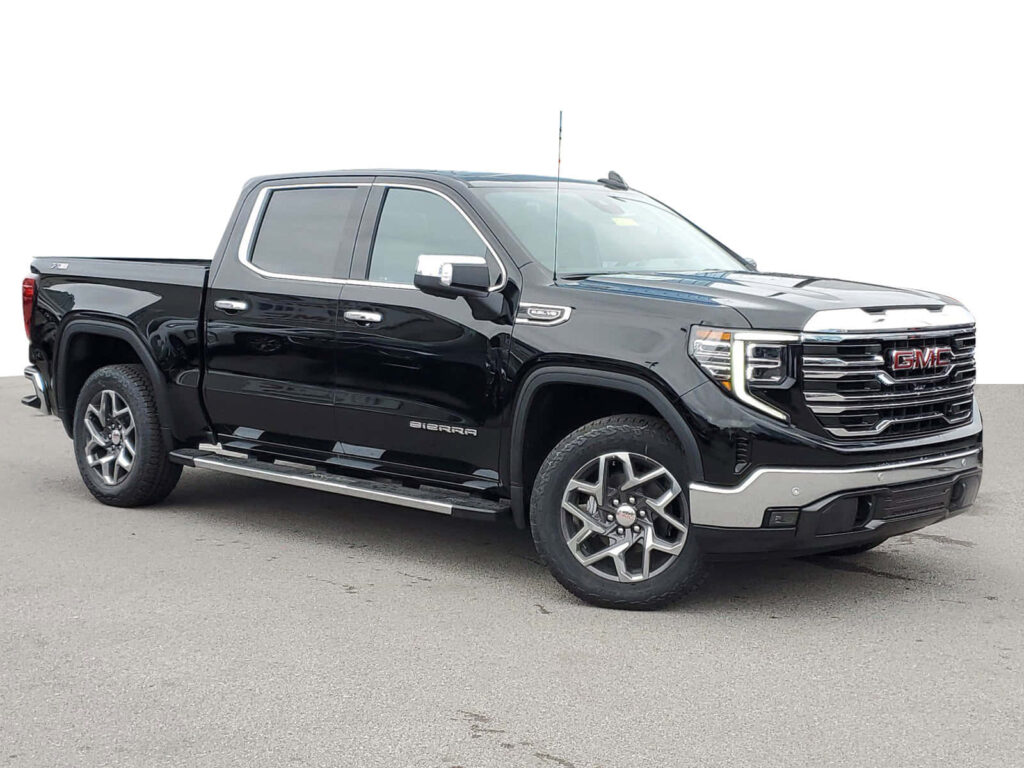 Sleek GMC Sierra Wallpaper: Modern Pickup Against Neutral Background