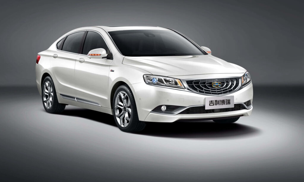 Sleek Geely Sedan Wallpaper: Modern Design & Polished White Elegance