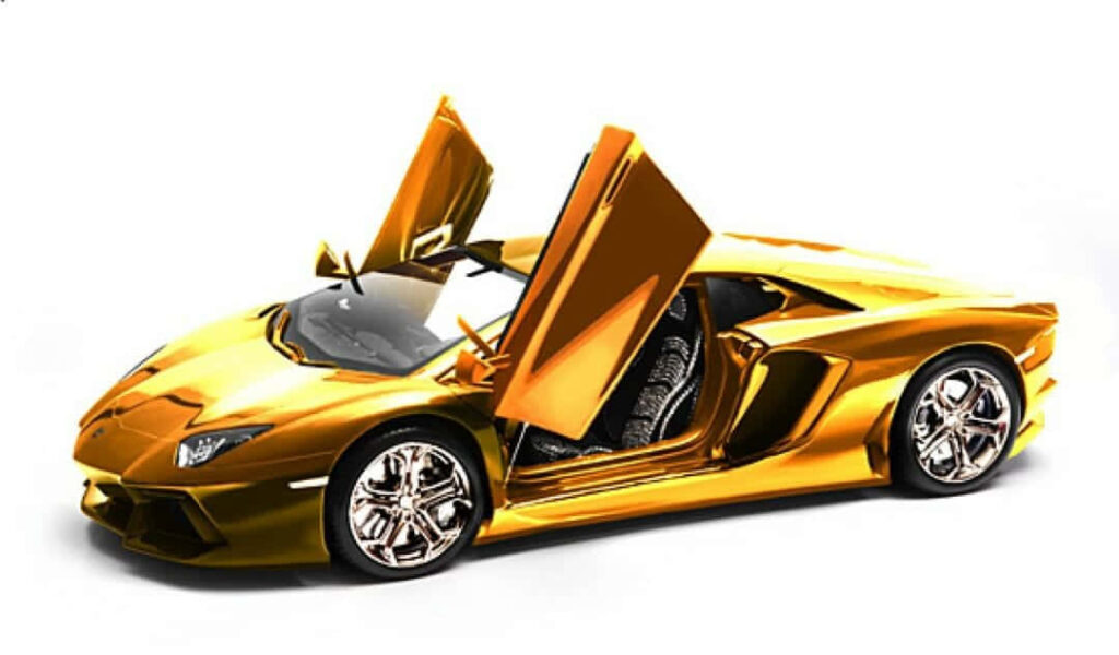 Sleek gold toy car with open doors shiny metallic finish detailed design on clean wallpaper background