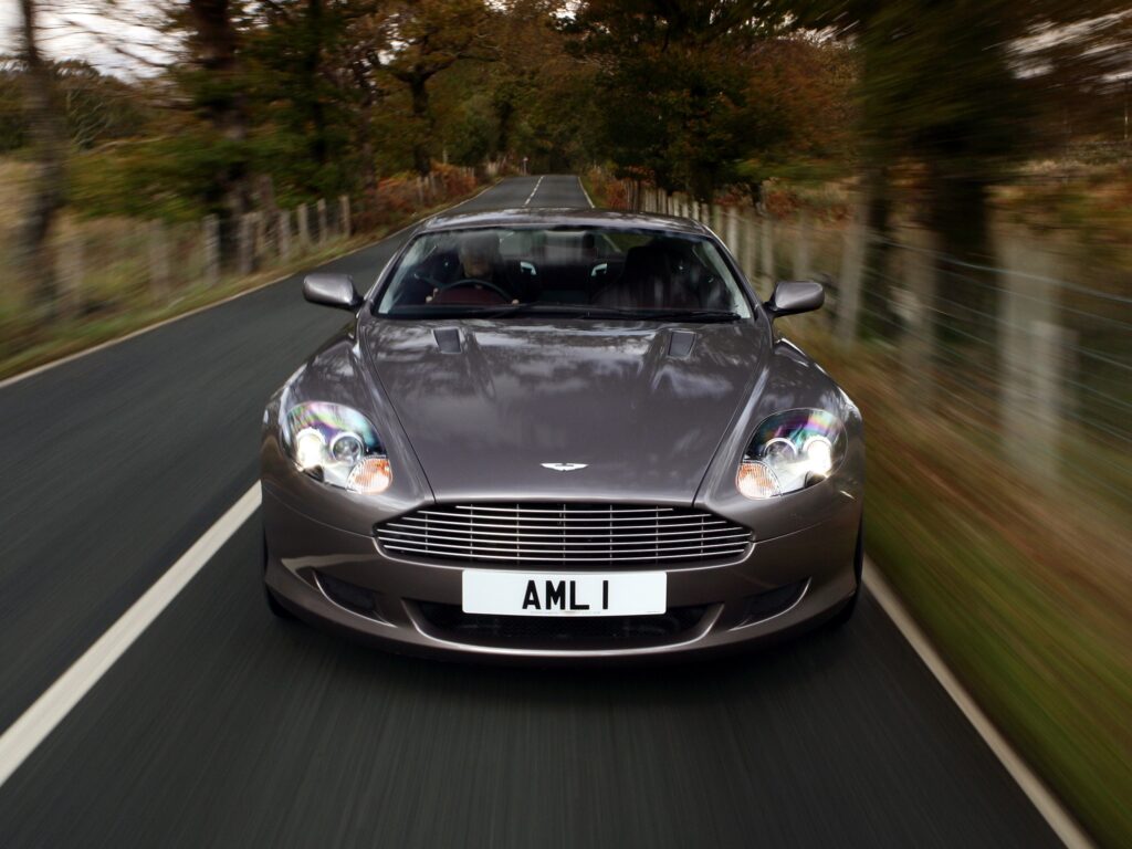 Elegant 2004 Aston Martin DB9 Wallpaper - Scenic Gray Beauty